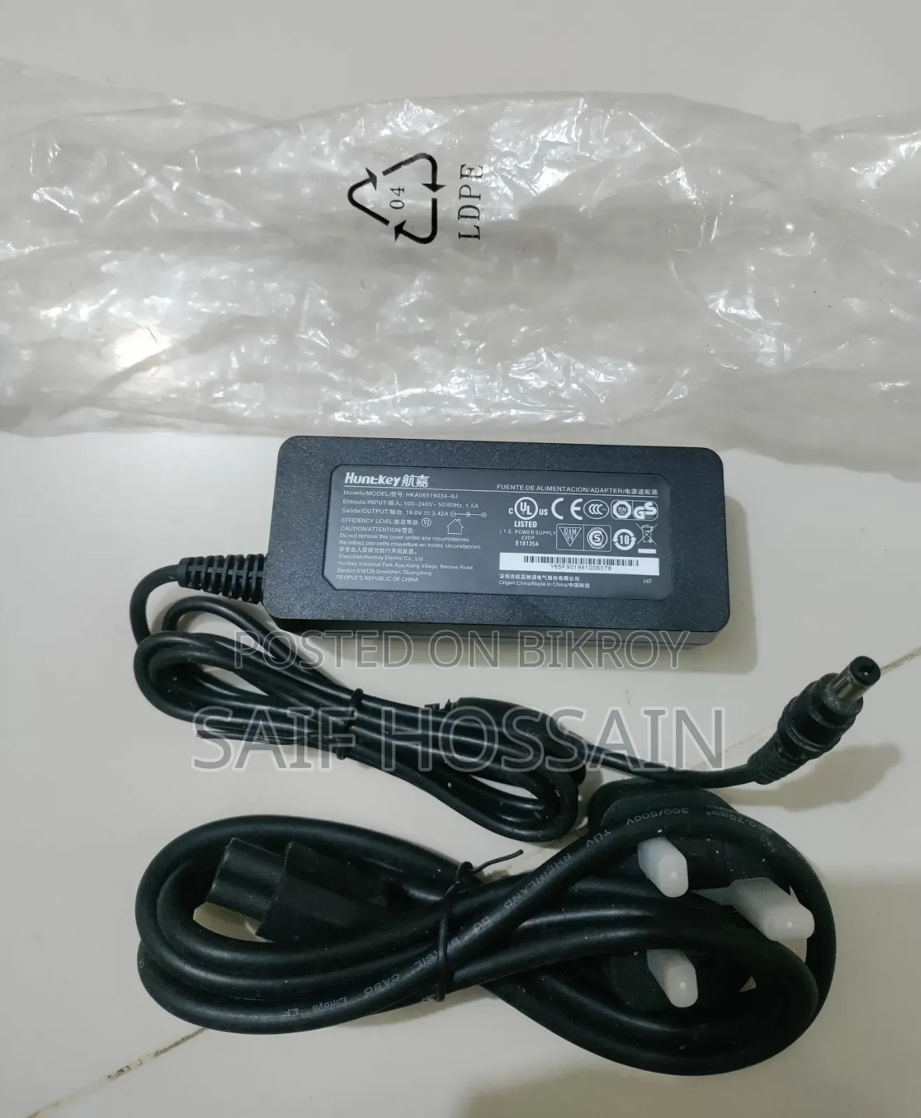 Huntkey 65w HP ল্যাপটপ চার্জার। নতুন এখনো ব্যবহার করা হয় নাই।