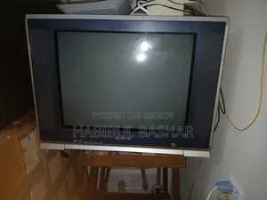 Used Box TV With Wooden Normal Rack