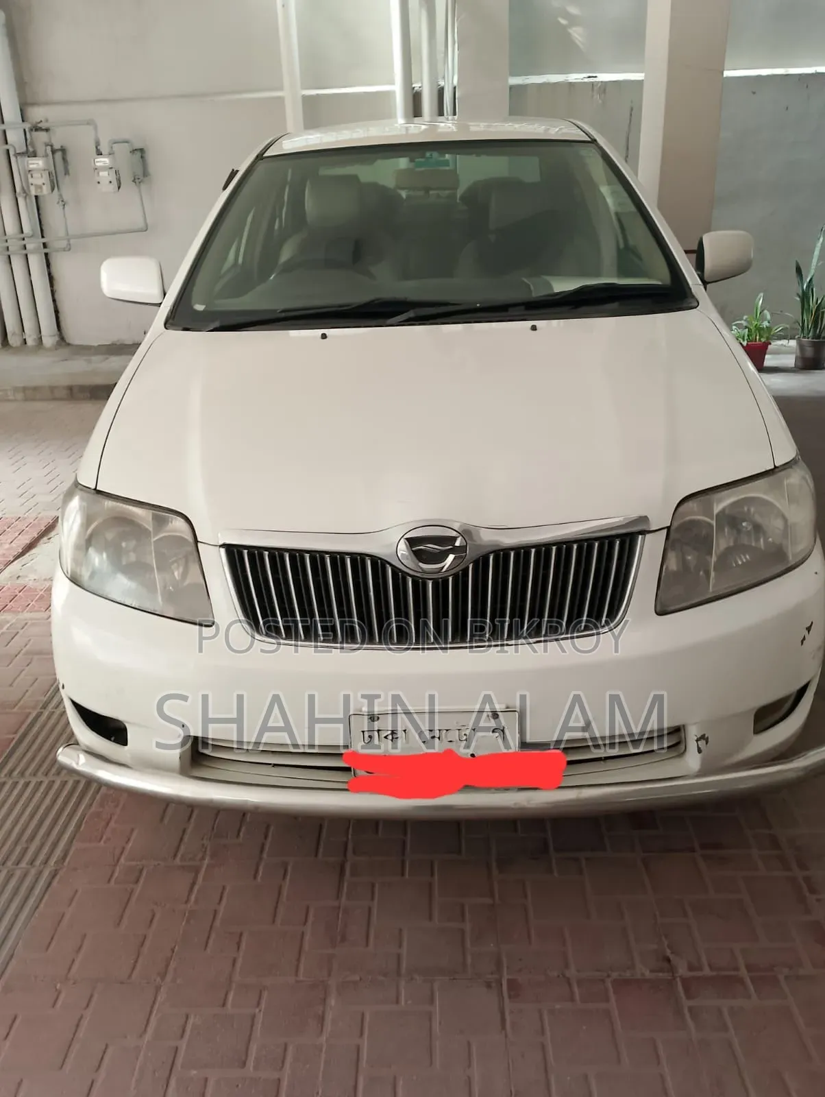 টয়োটা করোলা ২০০৬ সাদা