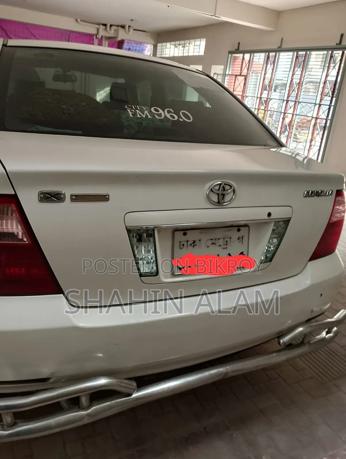 টয়োটা করোলা ২০০৬ সাদা