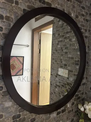 কাঠের তৈরী আয়না।brown Colour, Round Shape.