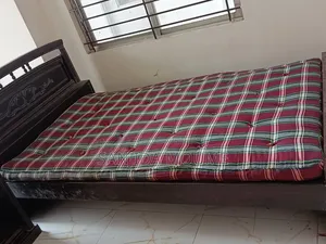 Wooden Bed With Side Table