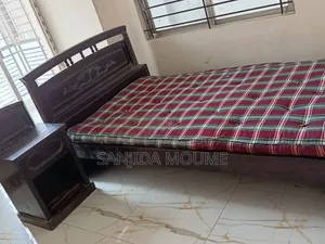 Wooden Bed With Side Table