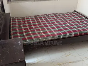 Wooden Bed With Side Table