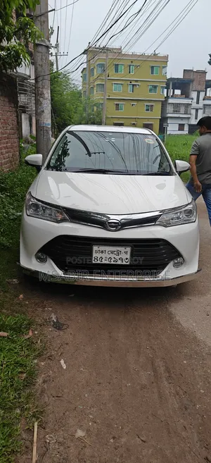 টয়োটা অ্যাক্সিও ২০১৫ হোয়াইট