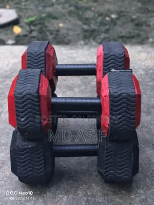 Dumbbells made with a stone mixture. These are sturdy and have precise weight.