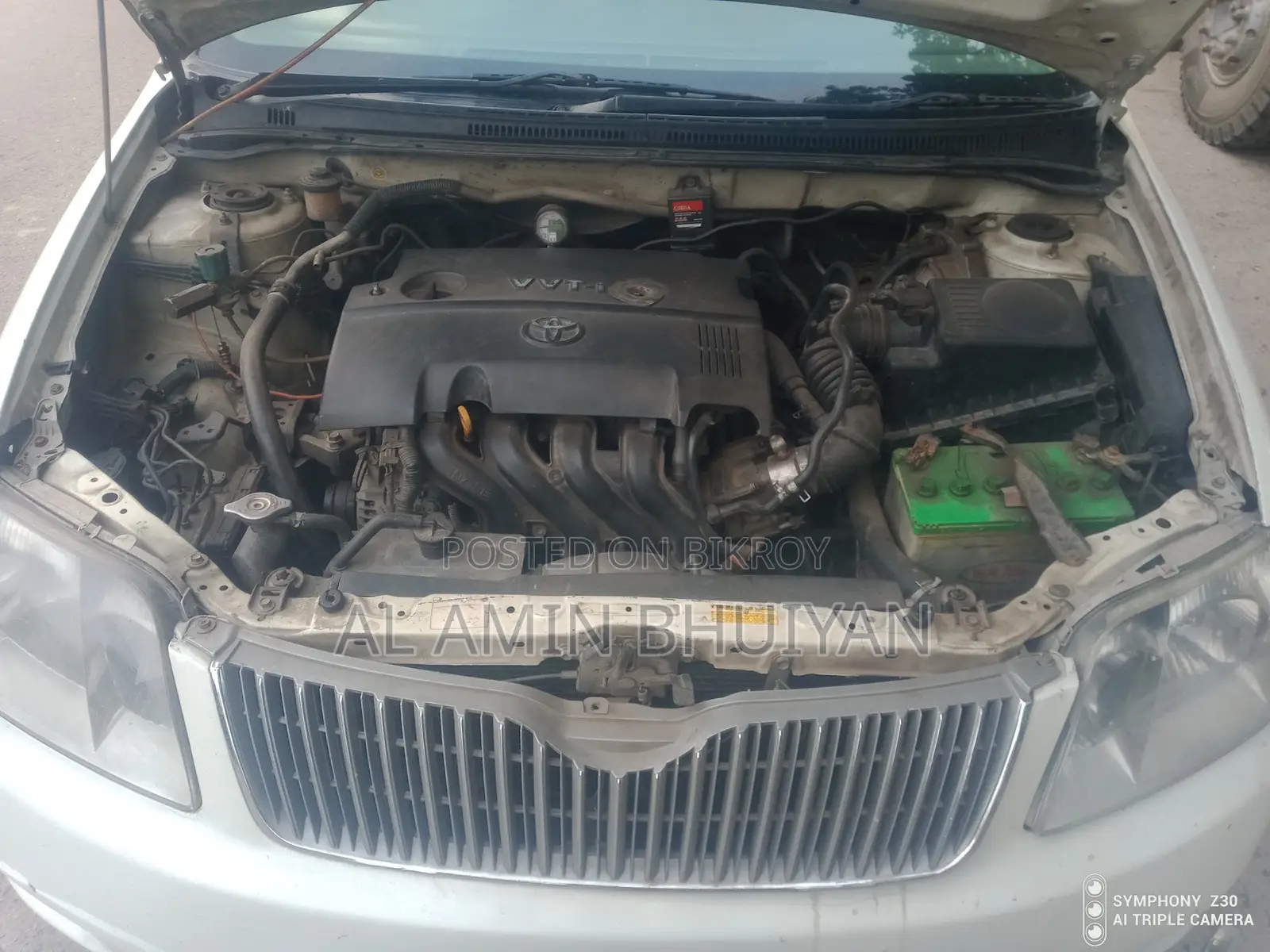 টয়োটা করোলা সেডান ২০০৫ সাদা