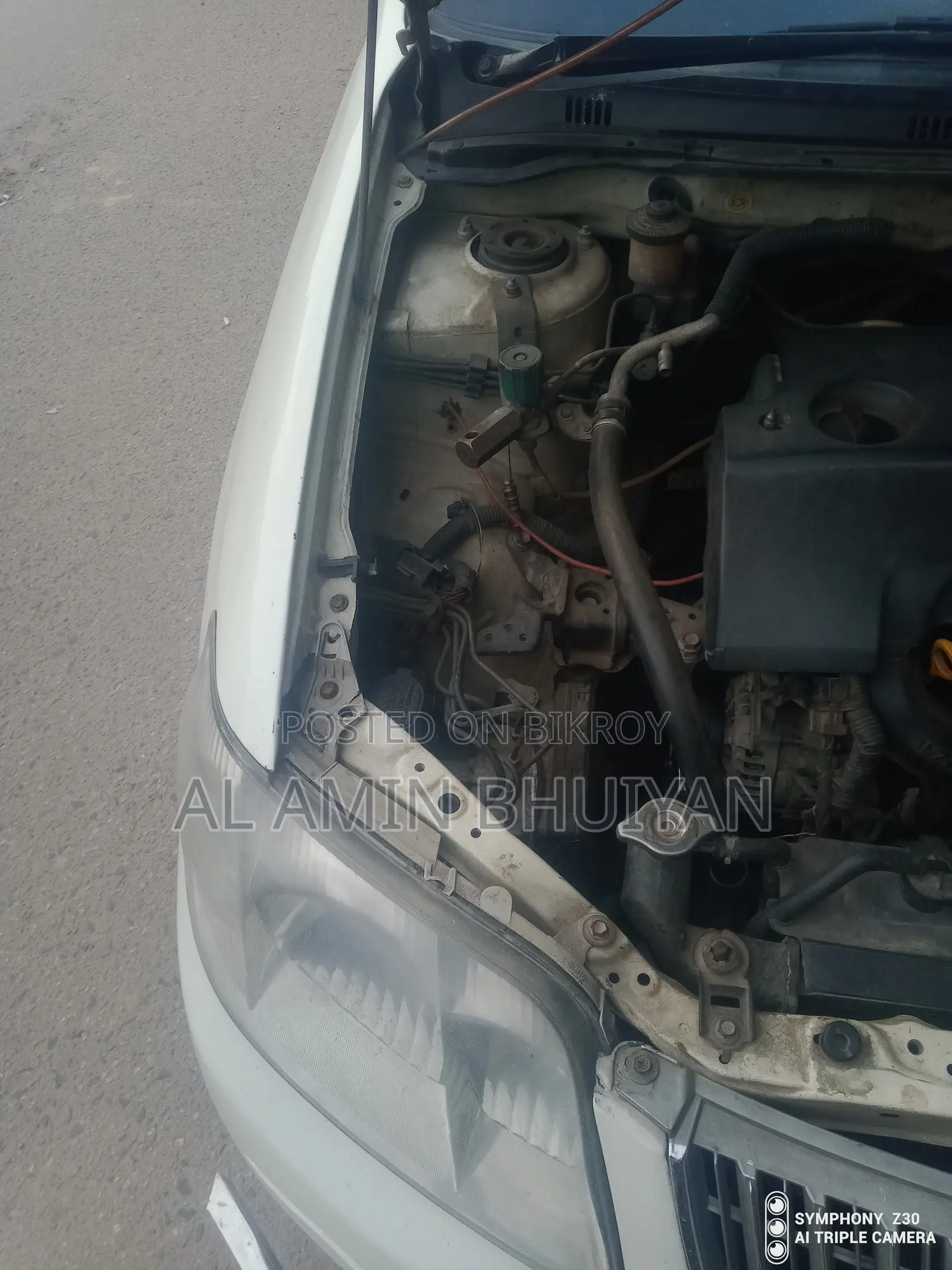 টয়োটা করোলা সেডান ২০০৫ সাদা