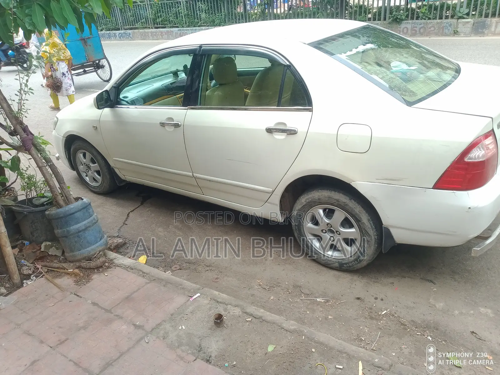 টয়োটা করোলা সেডান ২০০৫ সাদা
