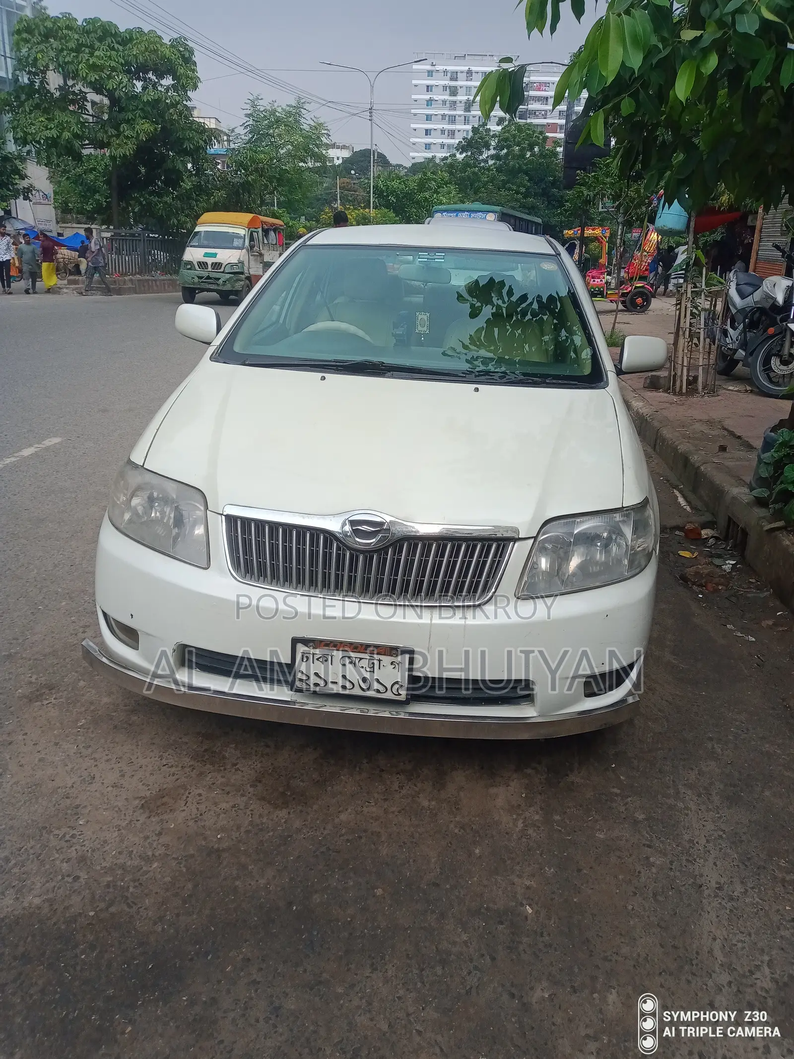 টয়োটা করোলা সেডান ২০০৫ সাদা