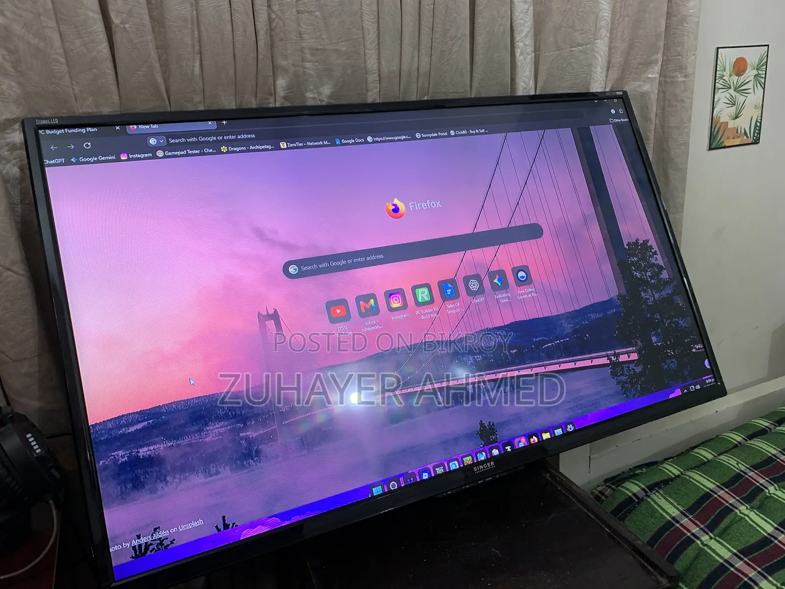 সিঙ্গার ফ্ল্যাট-স্ক্রিন টিভি