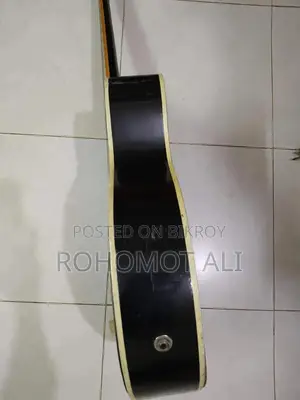 Custom Black Acoustic-Electric Guitar With Treble Clef Pickguard