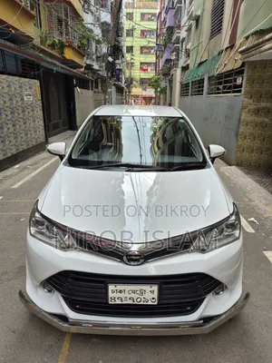 টয়োটা অ্যাক্সিও ১.৩ এক্স টুডব্লিউডি ২০১৬ সাদা