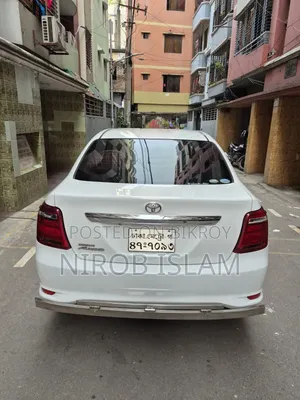 টয়োটা অ্যাক্সিও ১.৩ এক্স টুডব্লিউডি ২০১৬ সাদা