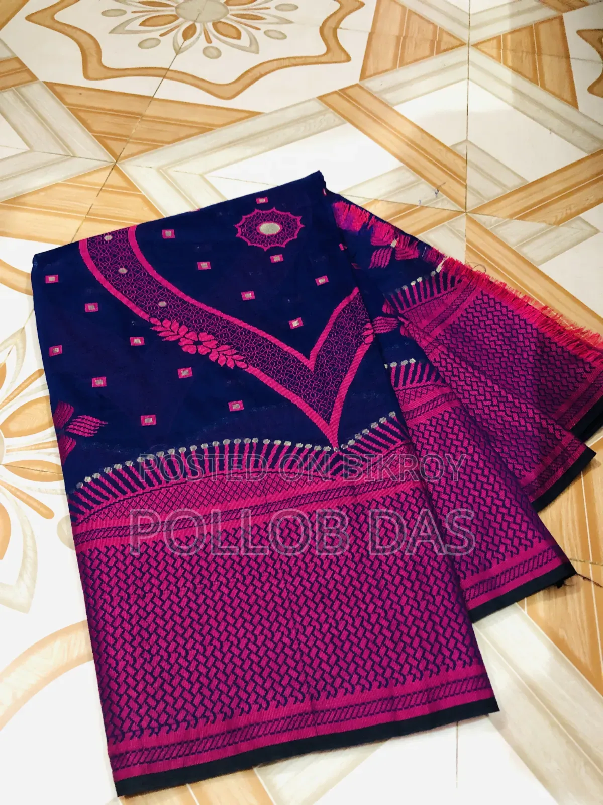 Used beautiful deep blue and rani pink saree.