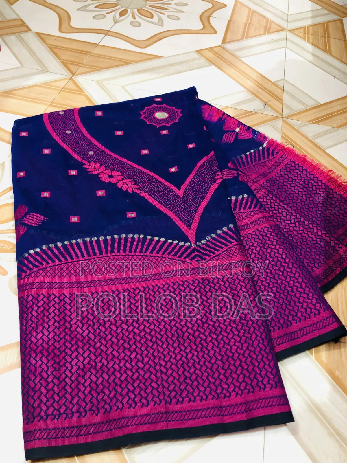 Used beautiful deep blue and rani pink saree.