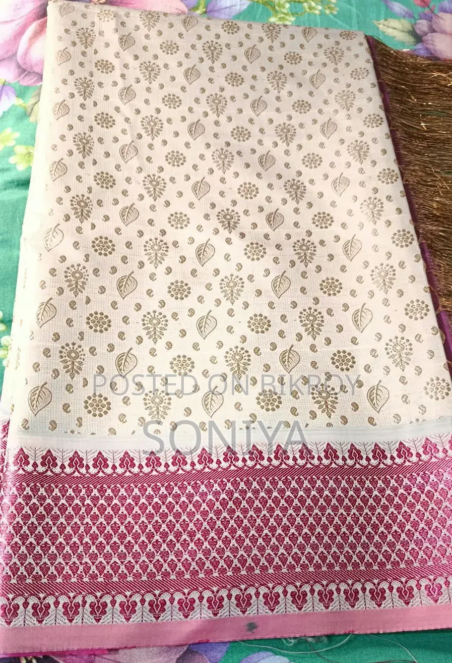 পূজা স্পেশাল ব্লাউজপিস সহ সফট জরী কাতান শাড়ি