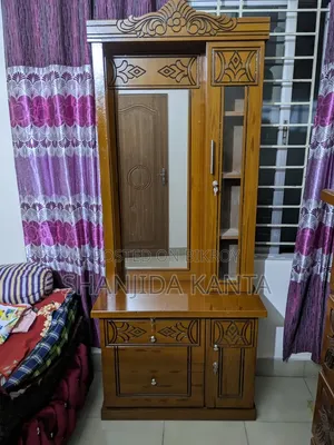 A dressing table will be sold. Bought two months ago. Price is 15 thousand Taka.