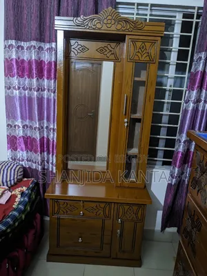A dressing table will be sold. Bought two months ago. Price is 15 thousand Taka.