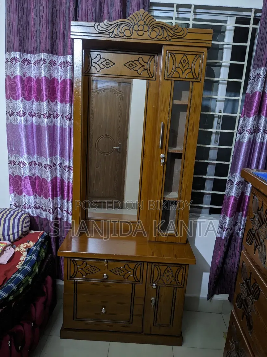 A dressing table will be sold. Bought two months ago. Price is 15 thousand Taka.