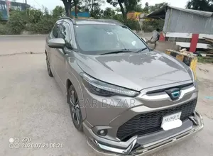 টয়োটা করোল্লা ক্রস ১.৮ হাইব্রিড ফ্রন্ট-হুইল ড্রাইভ ২০২১ ব্রাউন