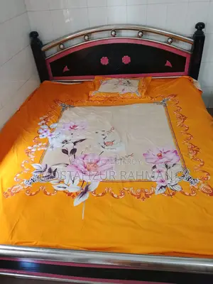An iron bed and mattress will be sold.
