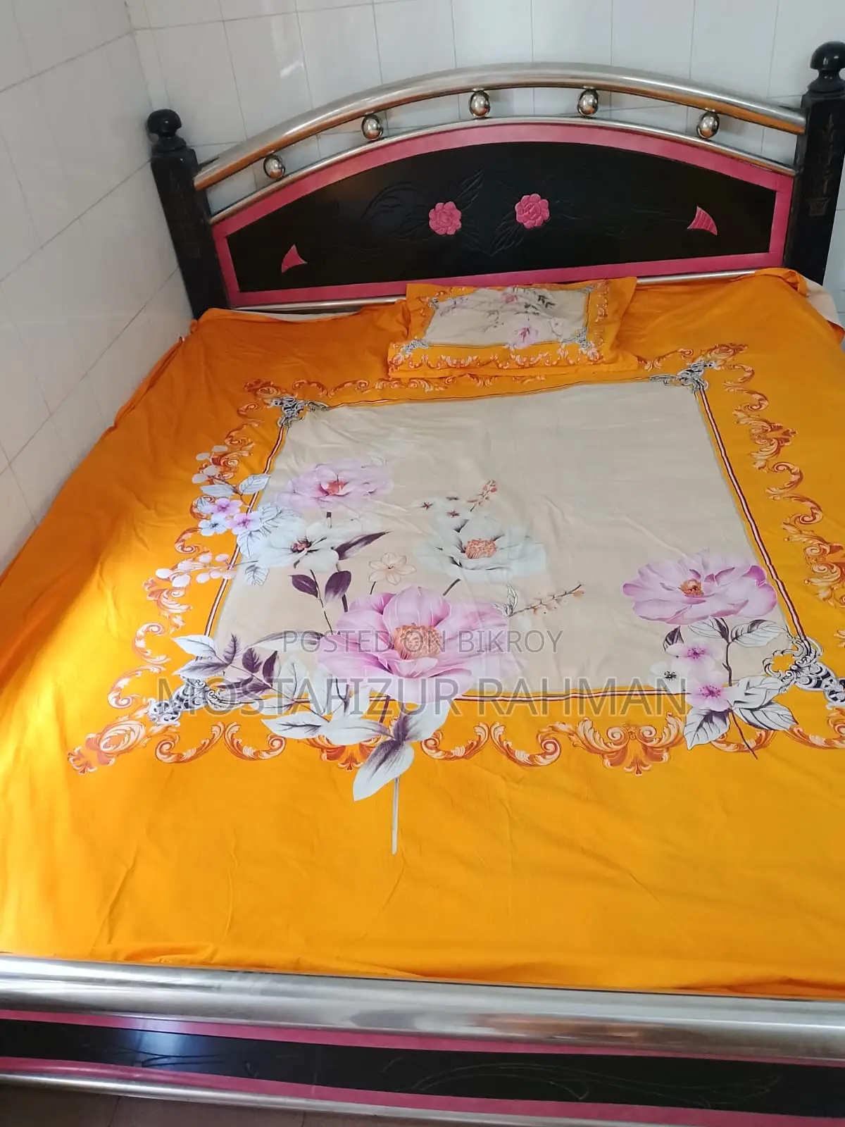 An iron bed and mattress will be sold.