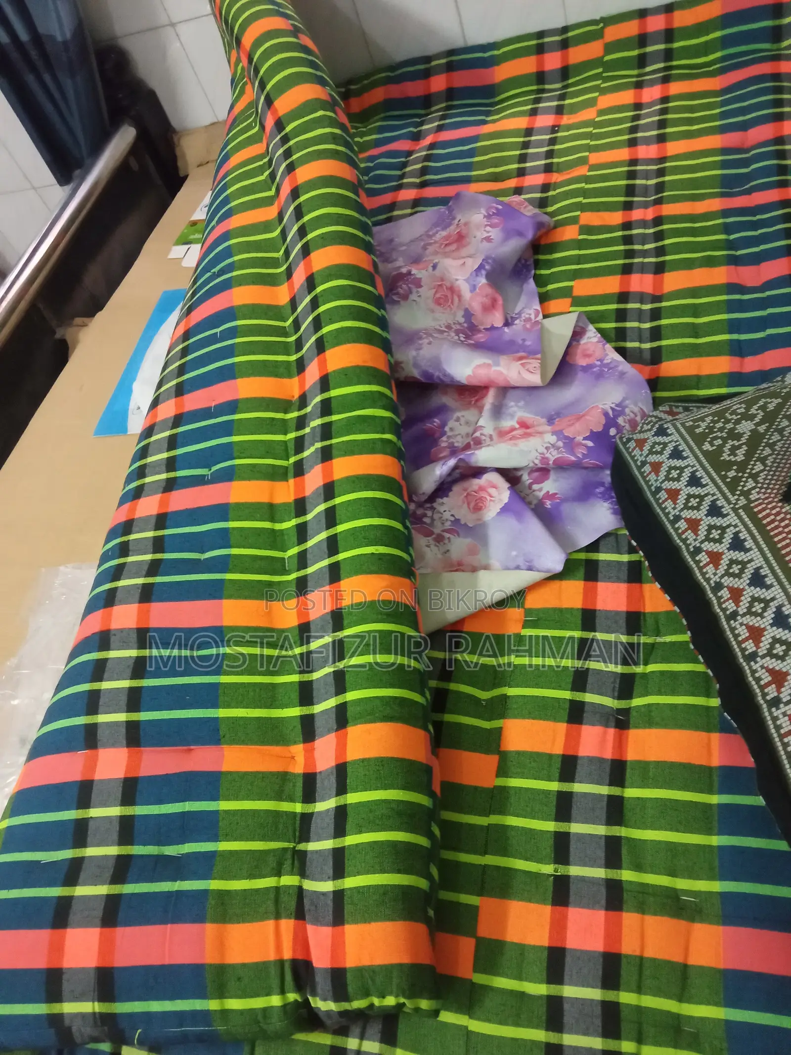 An iron bed and mattress will be sold.