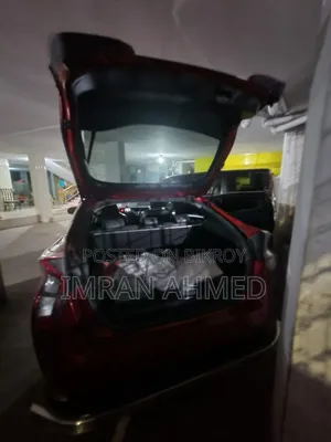 টয়োটা প্রিয়াস ৪ দরজা হ্যাচব্যাক (১.৮ লিটার ৪ সিলিন্ডার গ্যাস/ইলেকট্রিক হাইব্রিড সিভিসি) ২০১৬ রেড