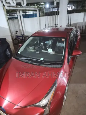 টয়োটা প্রিয়াস ৪ দরজা হ্যাচব্যাক (১.৮ লিটার ৪ সিলিন্ডার গ্যাস/ইলেকট্রিক হাইব্রিড সিভিসি) ২০১৬ রেড