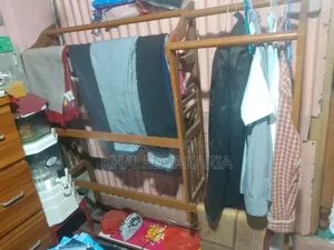 সেগুন কাঠের আলনা।