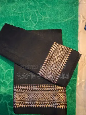 কালো নকশিপাড় হাফ সিল্ক শাড়ি