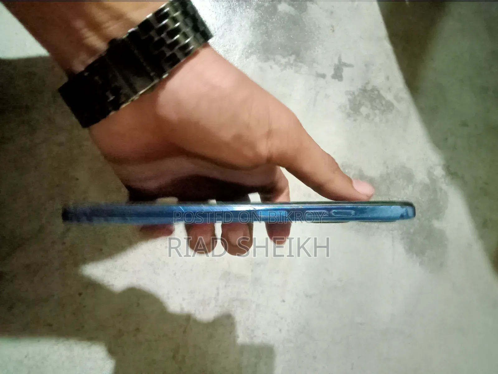 ট্রেডমার্ক স্পার্ক ১০সি ৬৪ জিবি নীল
