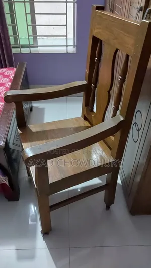 Teak wood armrest four wheel seating chair