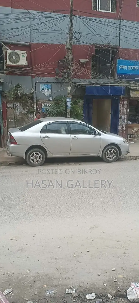 টয়োটা করোল্লা ২০০২ রূপালী
