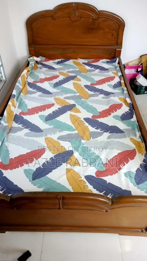 A beautiful Shil Koroi bed and a beautiful table