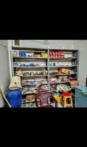 Grocery shop racks with goods