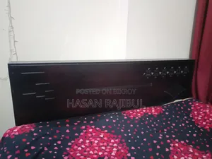 Bed made of Malaysian wood. 7 feet X 5 feet