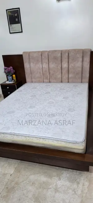 Bed Frame and Comes With Mattress Attached With the Bed Frame