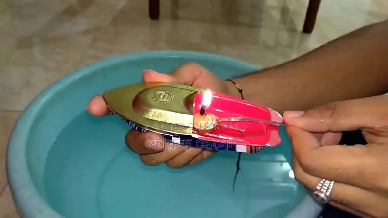 ৯০ দশকের টিনের নৌকা ( কেরোসিন তেলে চলে)
