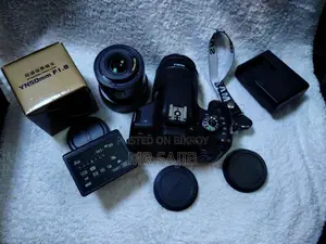 Canon EOS 750D ডিএসএলআর ক্যামেরা + ১৮-৫৫মিমি এসটিএম + ইয়াংনুও ৫০মিমি এফ/১.৮
