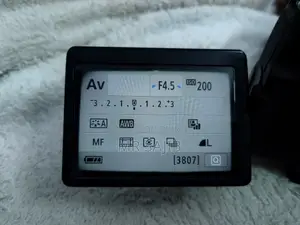 Canon EOS 750D ডিএসএলআর ক্যামেরা + ১৮-৫৫মিমি এসটিএম + ইয়াংনুও ৫০মিমি এফ/১.৮