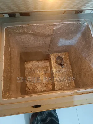 A Compact, Silver-Colored Rangs Chest Freezer (Deep Fridge)