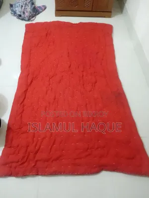 Quilt and 2 mattresses