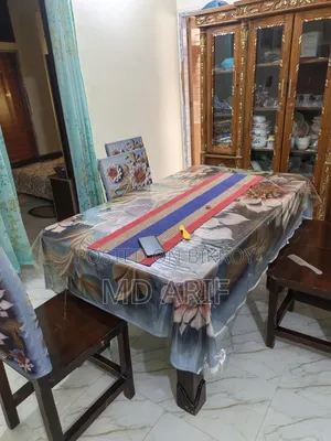 One segun wood wall showcase and another MDF board dining table
