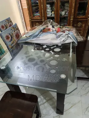 One segun wood wall showcase and another MDF board dining table