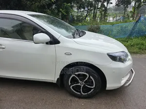 টয়োটা এক্সিও ২০০৬ পার্ল