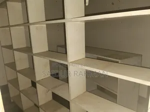 Two mahogany wood racks and one counter table will be sold