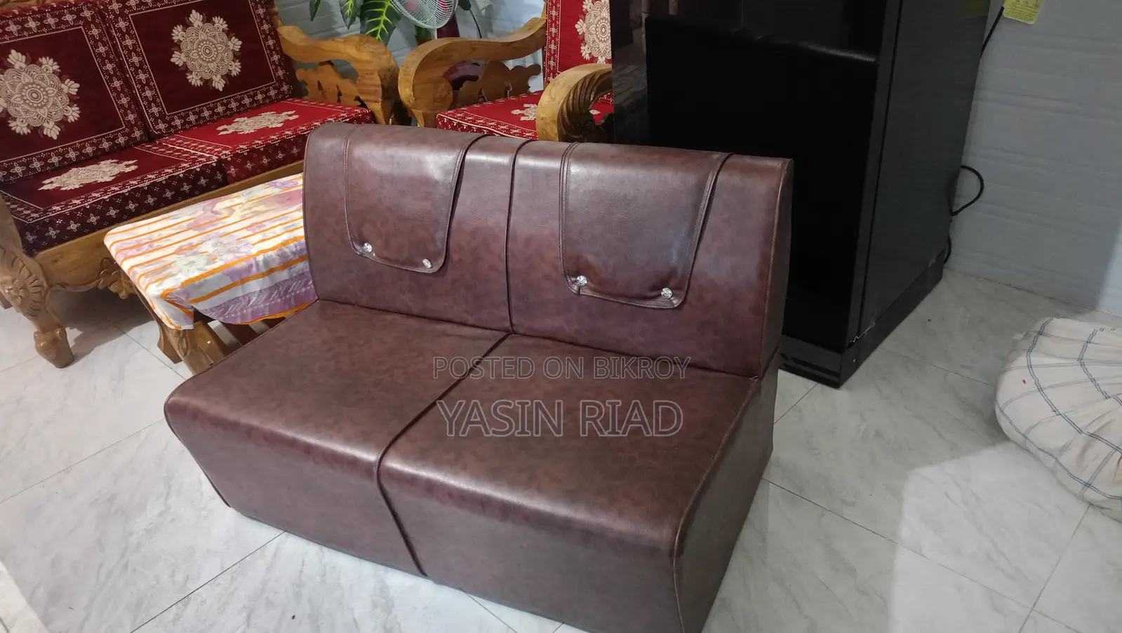 2-Seater Beautiful and Sturdy Sofa – Good Condition