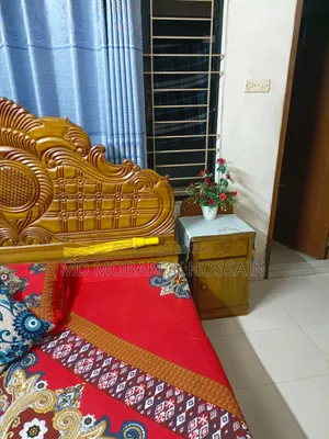 Wooden Bed 6 feet by 7 feet